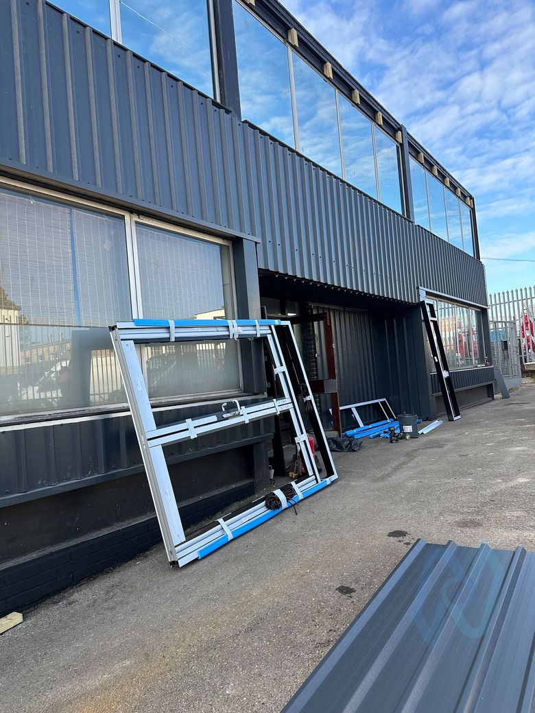 Shopline aluminium screen frames on site during installation