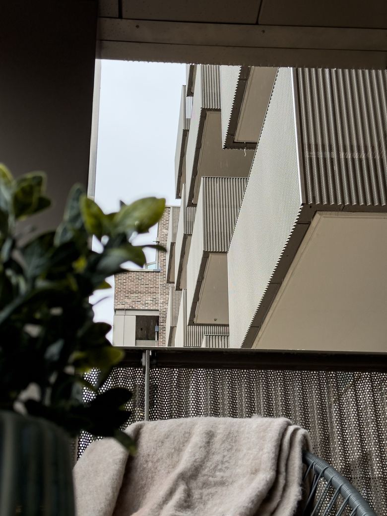 Access control reader on the balcony walkway