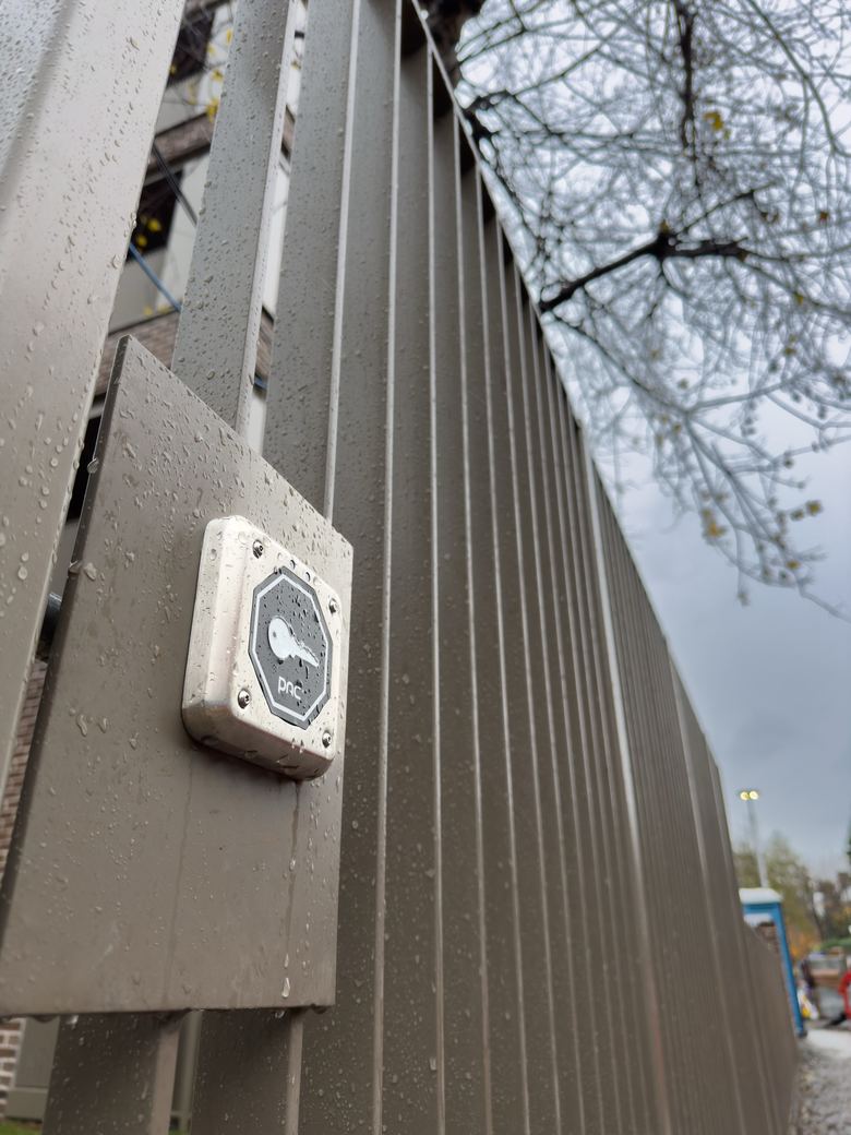 Weatherproof access control reader on a gate post