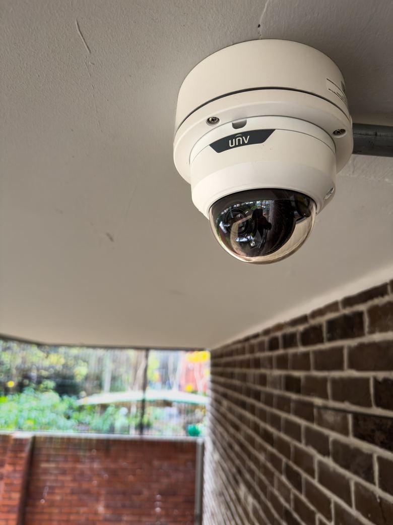 Uniview dome camera under a covered walkway