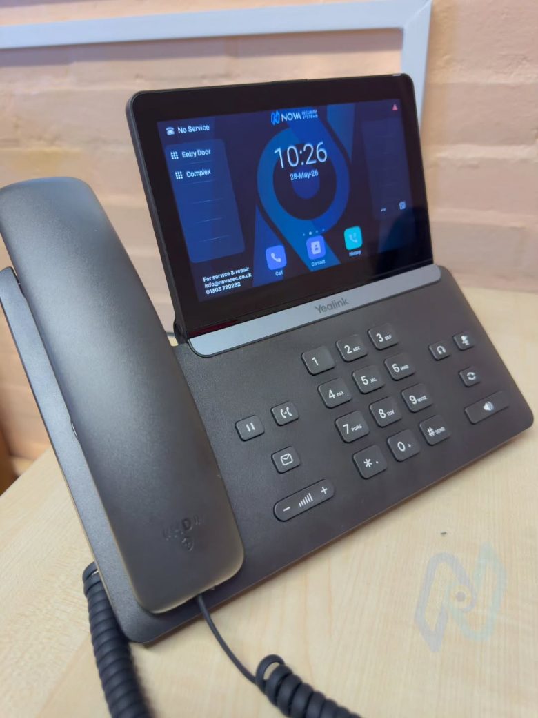 Yealink IP desk phone with touchscreen in the school office