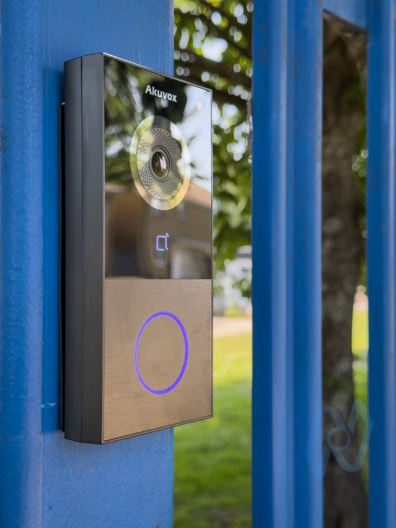 Close-up of the Akuvox E12 video door station at the school gate