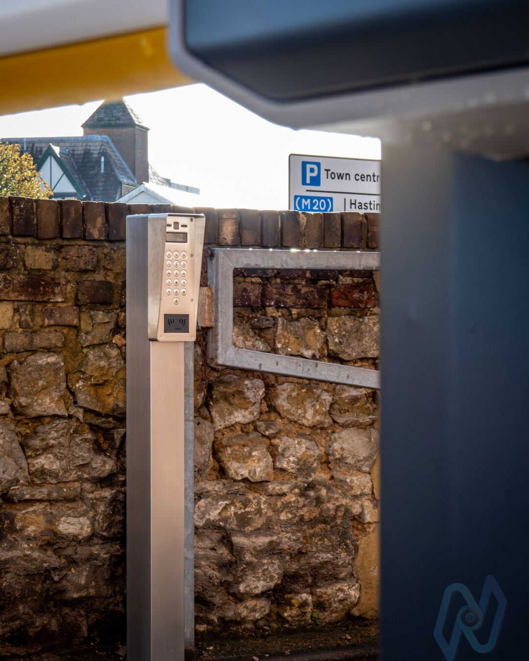 The entry pedestal beside the barrier at the car park entrance
