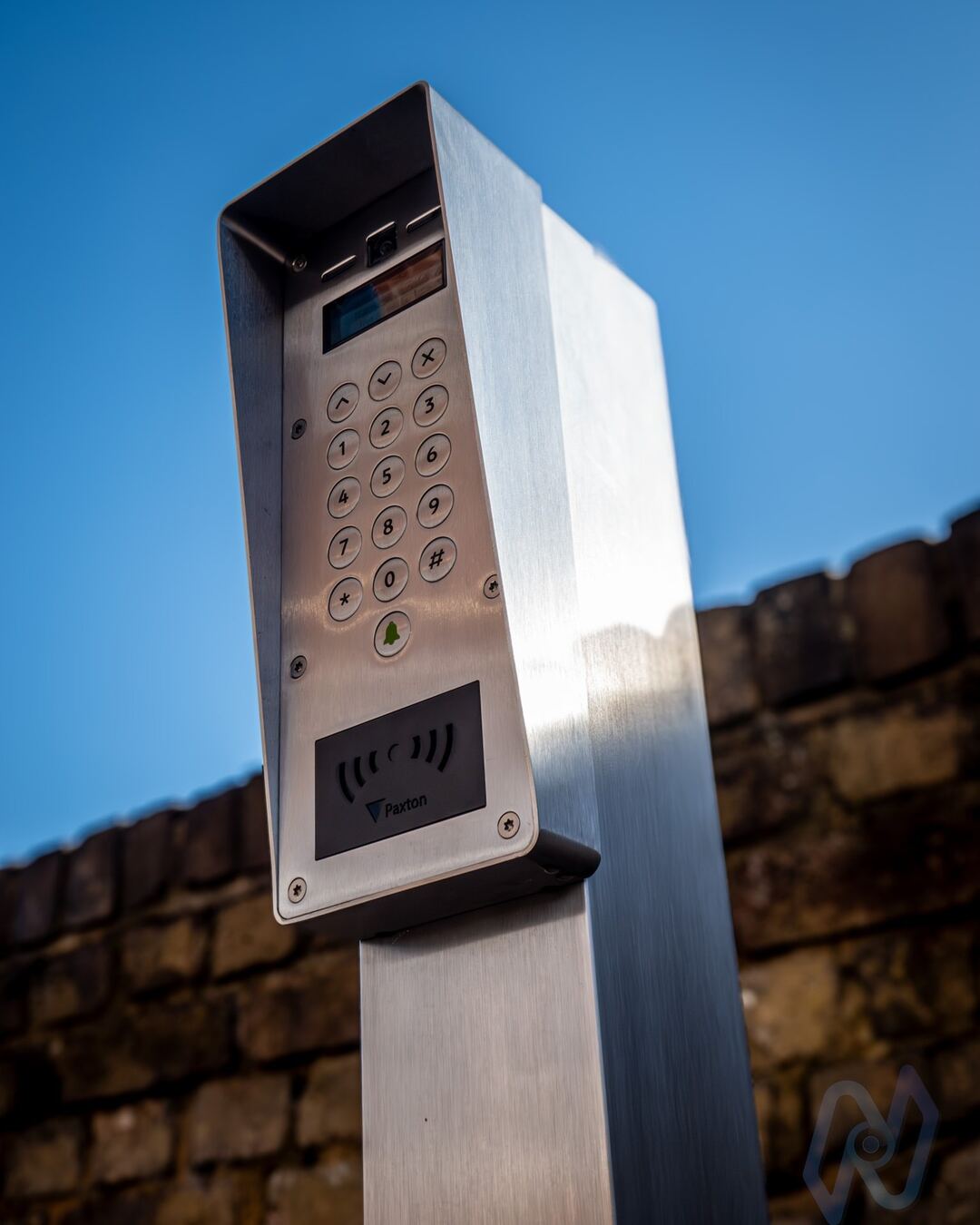 Paxton Net2 Entry keypad and reader on a stainless steel pedestal