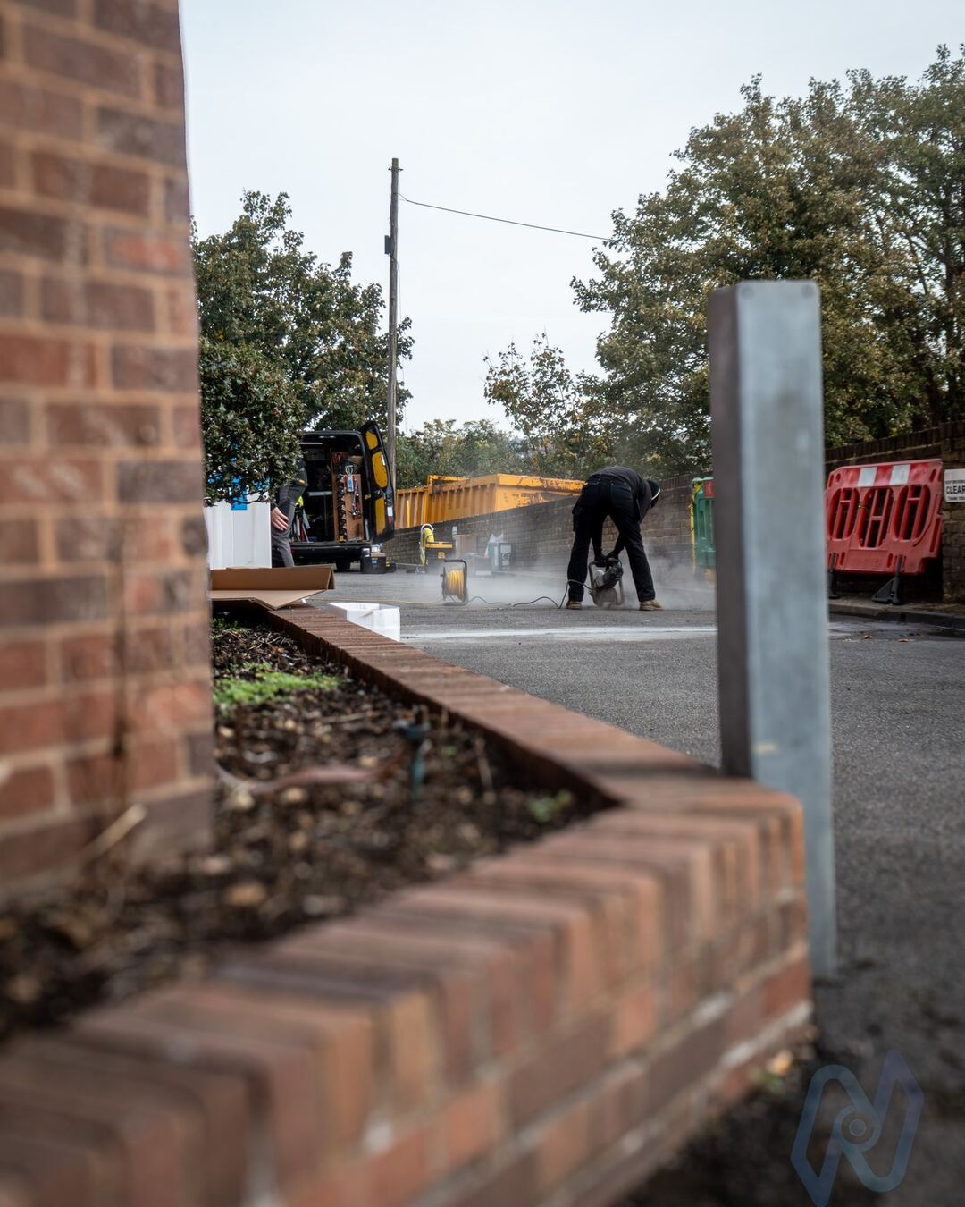 The entrance during installation, with groundwork under way
