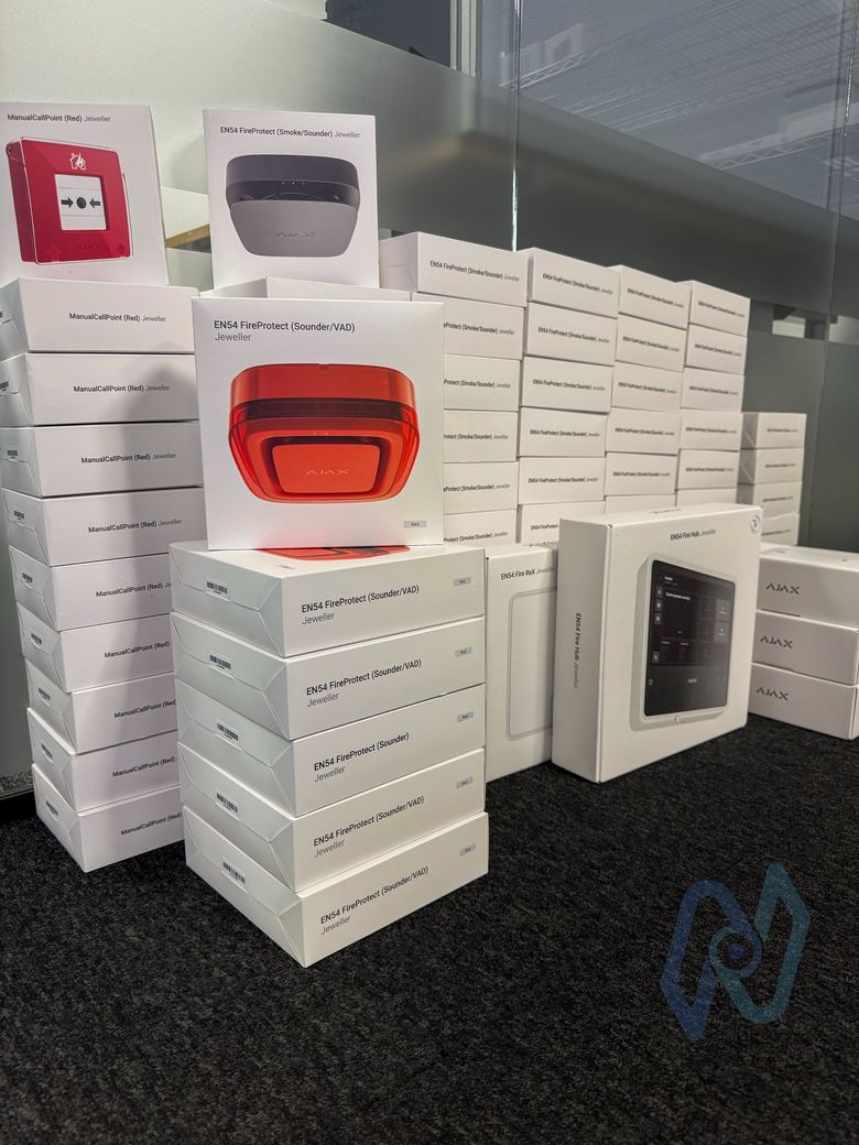 Boxes of Ajax EN54 wireless fire devices ready to install