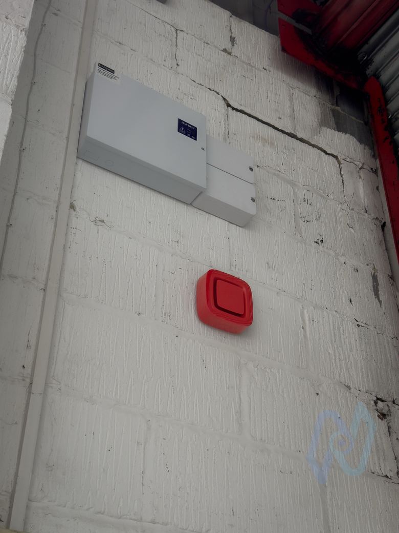 Fire Beam unit and sounder on a block wall