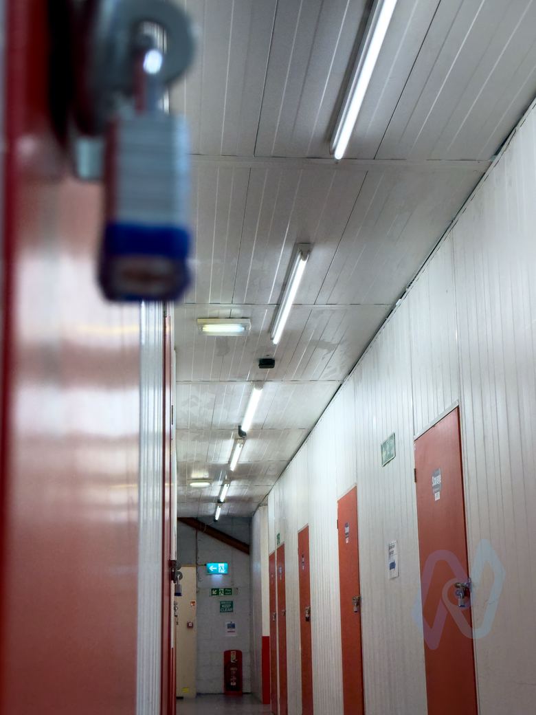 Storage corridor with orange unit doors