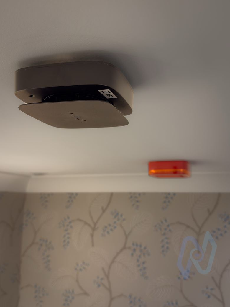 Ajax EN54 wireless detector on a ceiling
