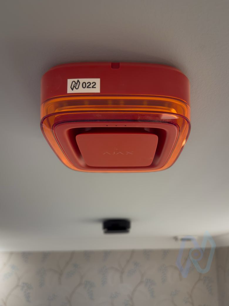 Ajax EN54 wireless sounder and beacon on the ceiling