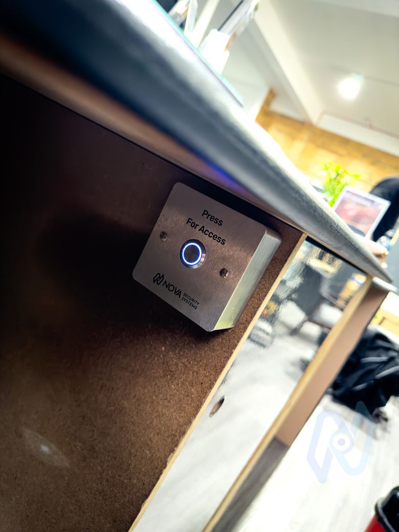 Access button under the reception desk