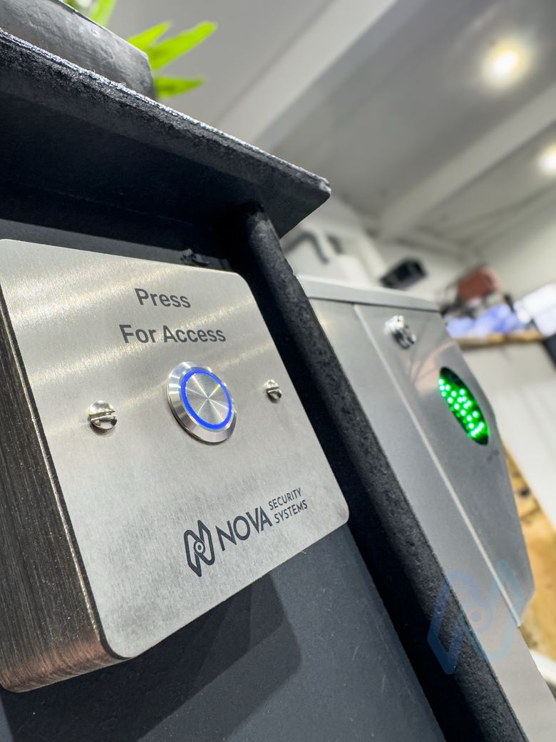 Nova “Press for access” button beside the turnstile