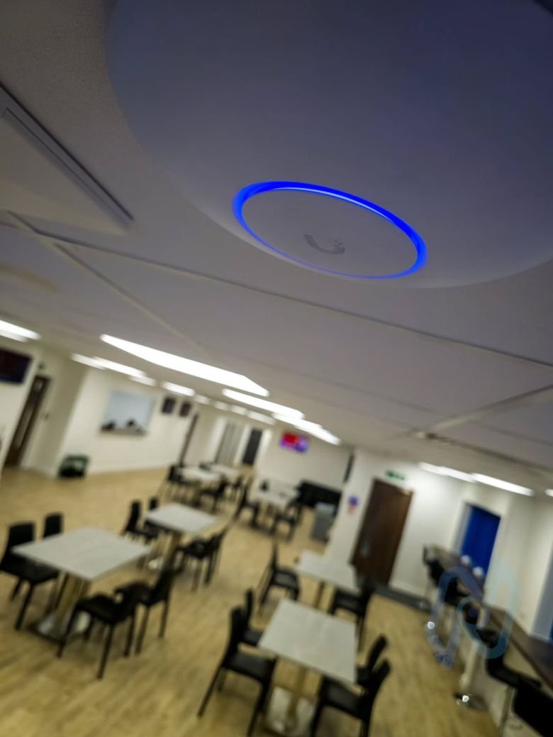 Ubiquiti WiFi access point on the ceiling of the drivers’ canteen