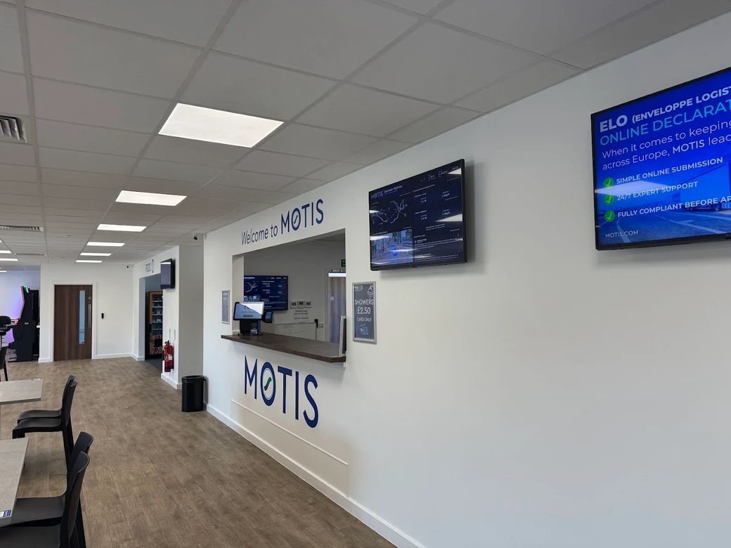 The Motis reception and drivers’ lounge at Cheriton, with driver information screens on the wall