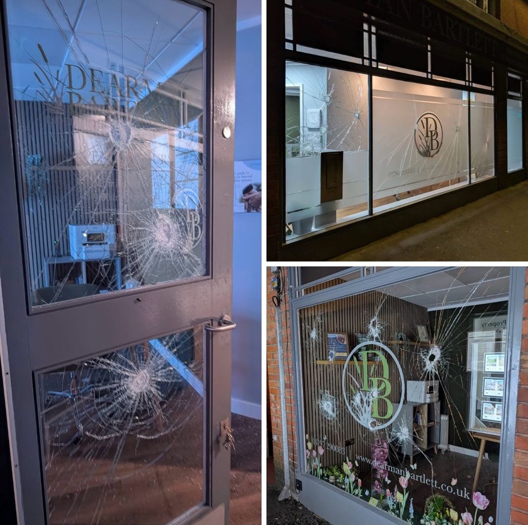 Smashed shop windows at Dearman Bartlett after the hammer attack