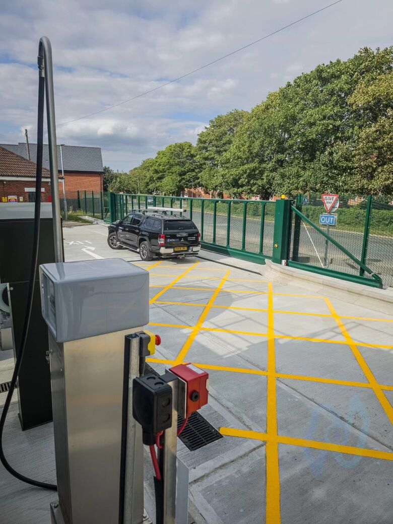 Access control pedestal beside the gate