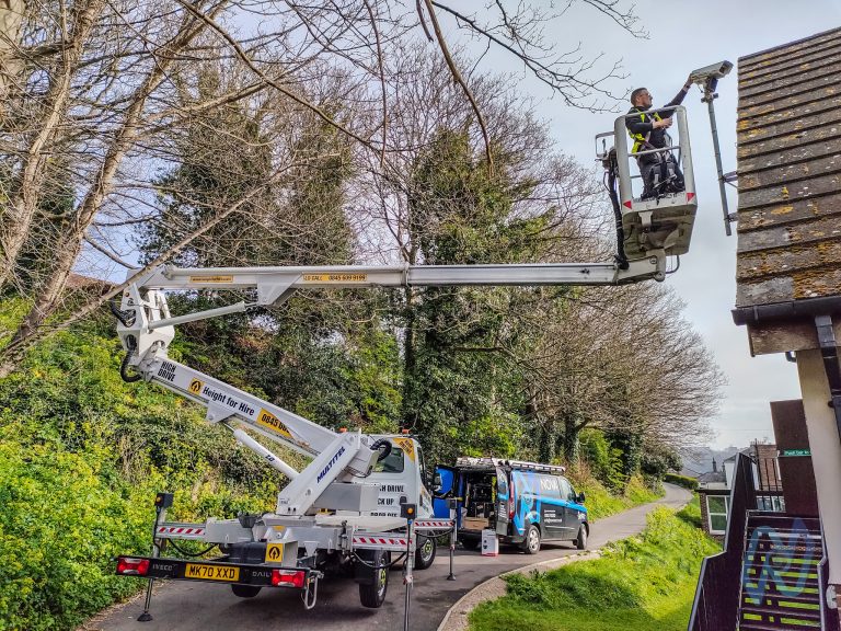 A Nova engineer installing a CCTV camera from a cherry picker