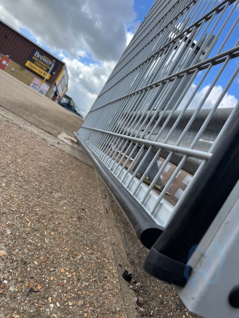 The commercial mesh gates seen along their length