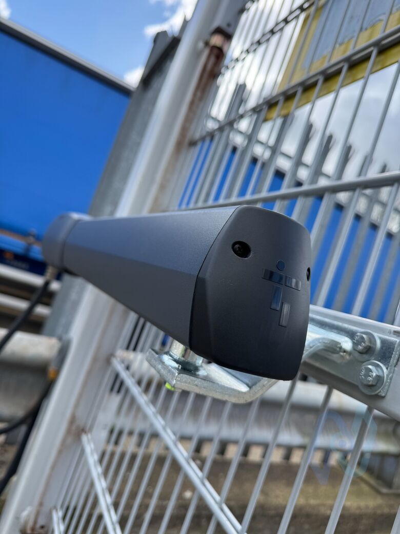Close-up of a CAME ATI gate motor and its bracket