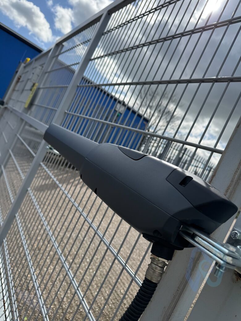 A CAME ATI motor on a mesh gate, with its cable gland