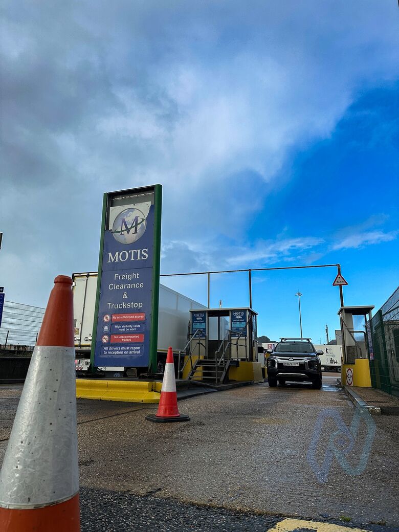 The Motis Freight Clearance and Truckstop sign at the Dover entrance