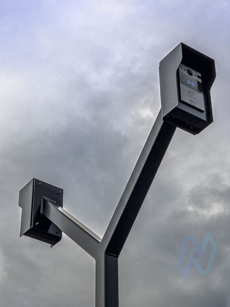 An intercom post with heads at two heights, for car drivers and lorry cabs