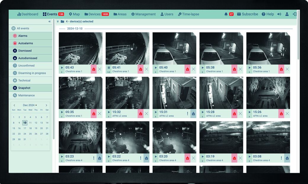 The Reconeyez Cloud dashboard on a screen, showing a grid of alarm photos