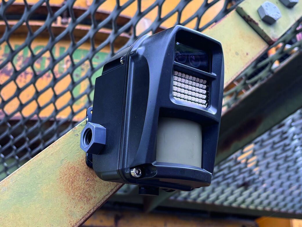 A Reconeyez detector fixed to a steel mesh walkway on a construction site